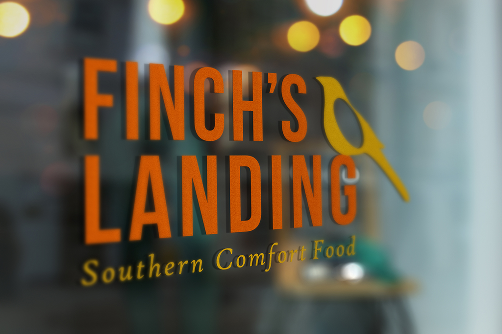 Finch's Landing Logo on a storefront